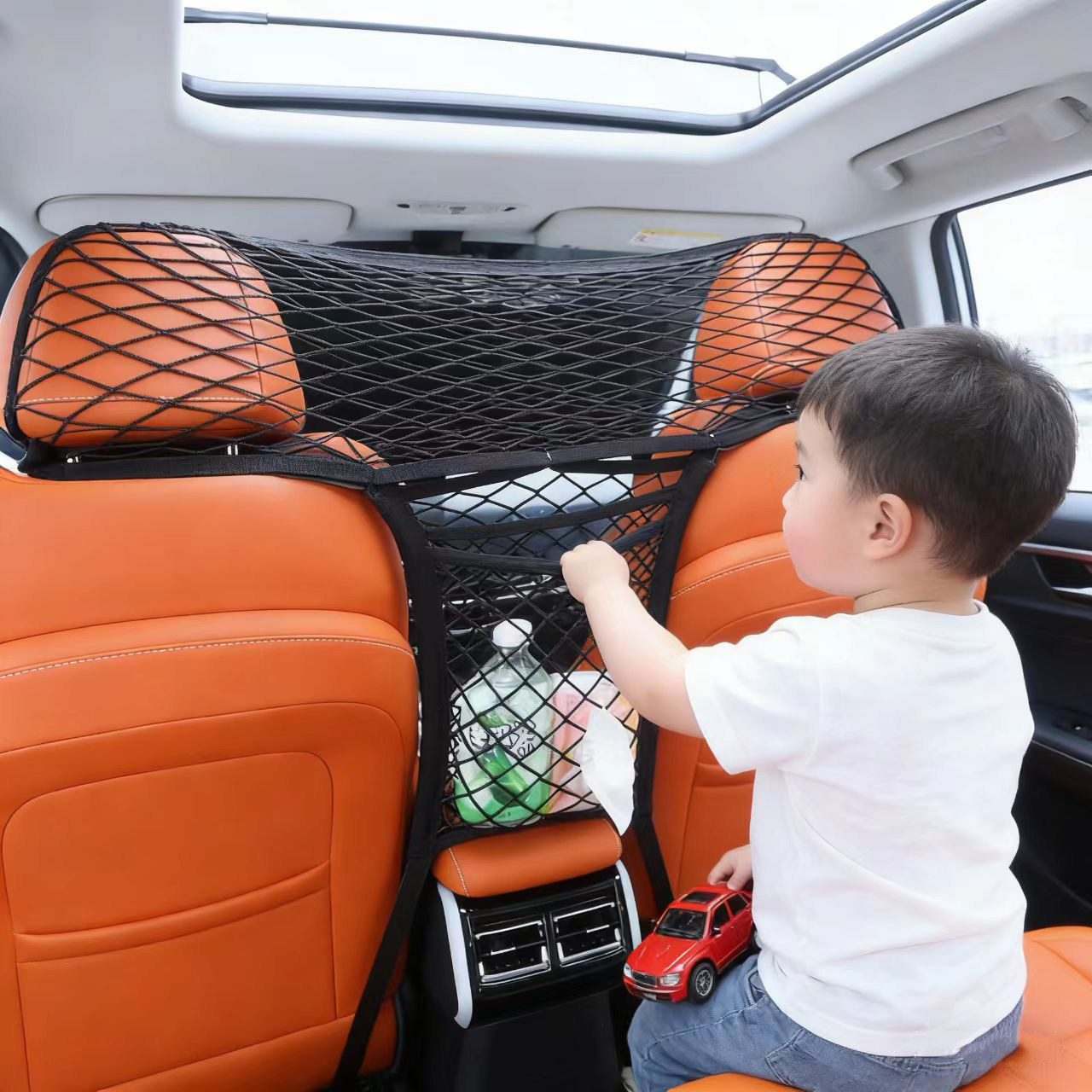 汽车座椅中间网兜储物袋中控挡小孩隔离网车内安全防护网隔断神器
