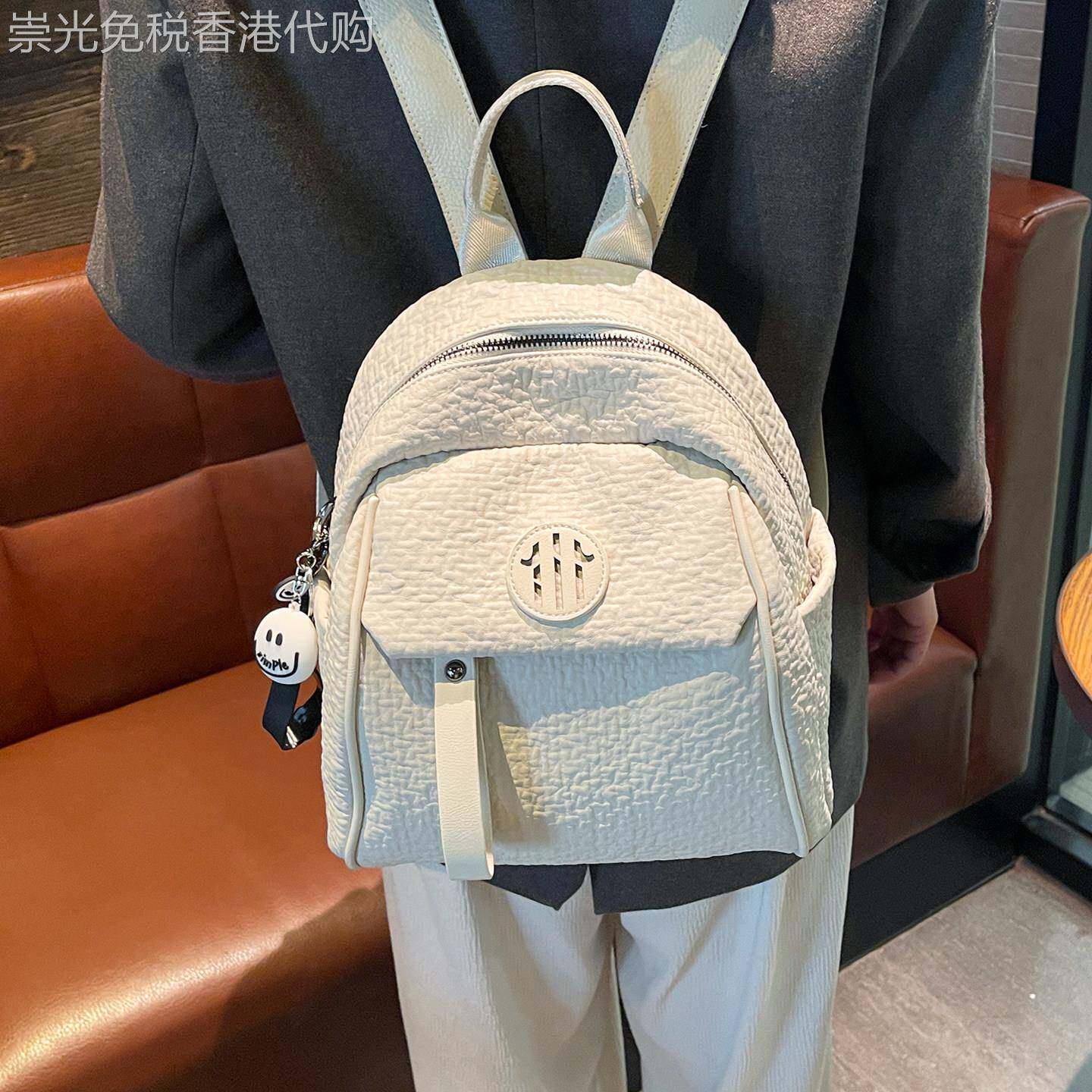 法国DUDK高颜值小背包女新款通勤轻便双肩包洋气百搭贝壳旅游包潮
