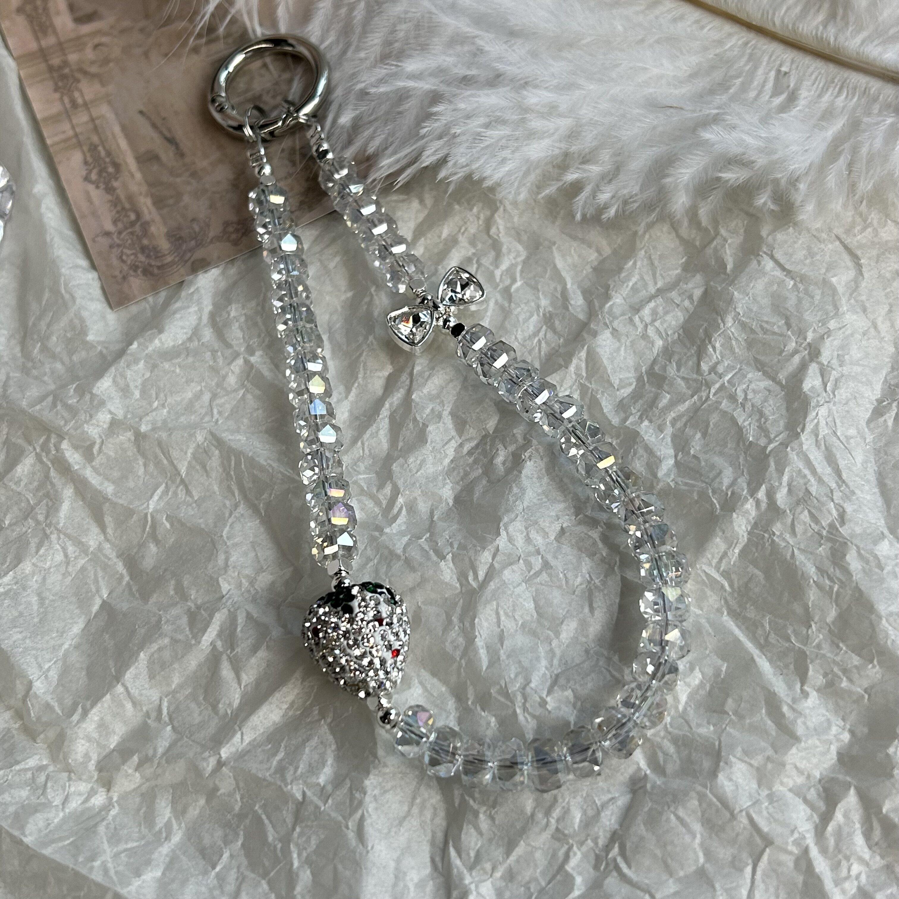 高级感草莓水晶手机链女式高端链绳串珠人造水晶手机挂件奢华闪钻