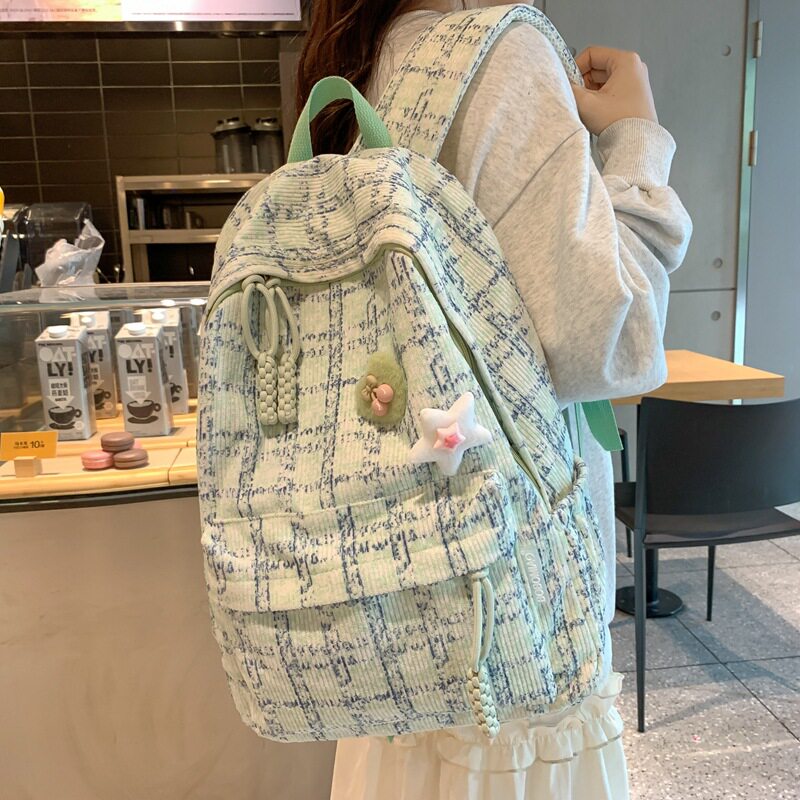 日本新款小众初中学生书包条绒男女双肩包大容量旅行背包潮流