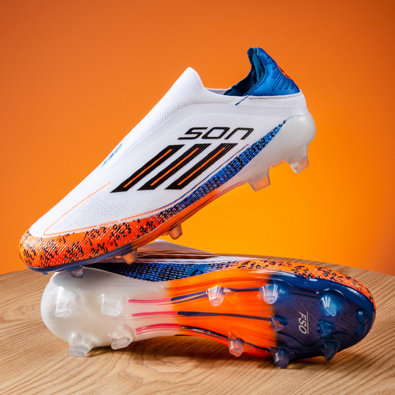 奥莱专柜C罗刺客足球鞋2025新款男女款长钉青少年防滑训练鞋工厂F