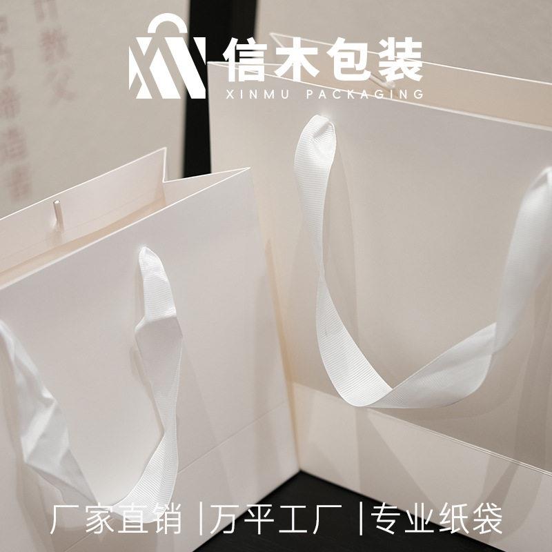 新款直销服装店手提袋子礼品包装袋子现货简约ins纯色购物袋白色