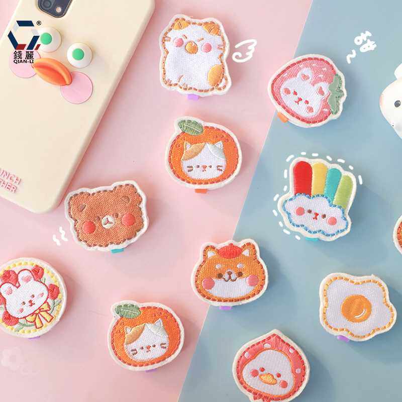 新款直销【钱丽】刺绣驱蚊香囊卡通香包便携随身手工防蚊胸扣成品,纺织面料/辅料/配套,印唛/织唛,淘宝优惠券,粉丝福利购,淘宝优惠卷