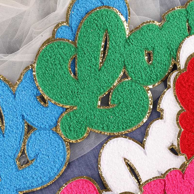 新款直销电脑绣花标英文字母刺绣贴毛巾绣服装辅料DIY补丁布标雪