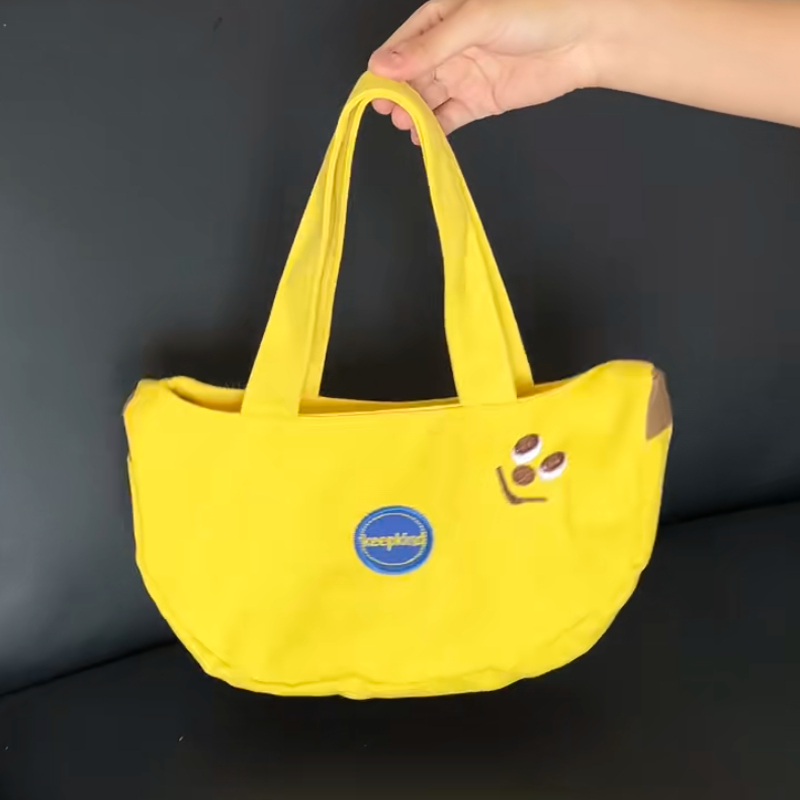 ANNAHOUSE可爱香蕉卡通刺绣帆布包上班便捷手提包宝妈外出手拎包