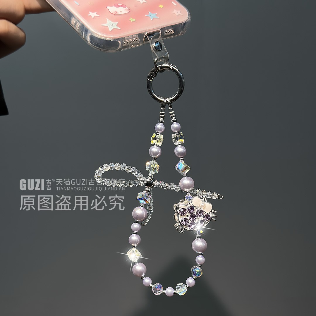 紫色珍珠新款手机链镶钻KT凯蒂猫高级感蝴蝶结串珠包包拉链手机壳链条短款挂件手腕小众水钻轻奢手工手机挂绳