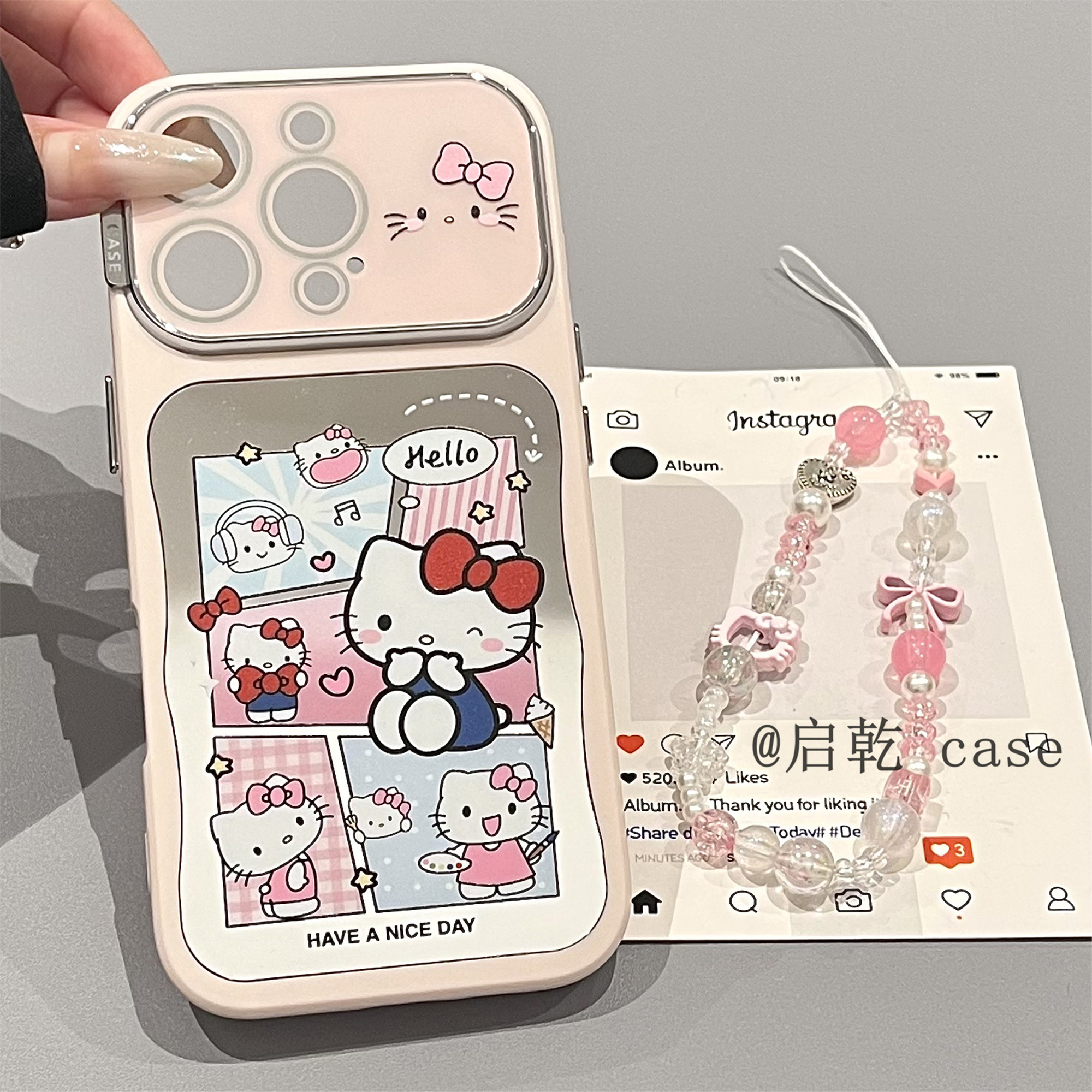 启乾 镜面凯蒂猫插画腕带iPhone16/15手机壳适用苹果14/13promax自带镜头膜链条挂绳哈喽HelloKitty新款镜子