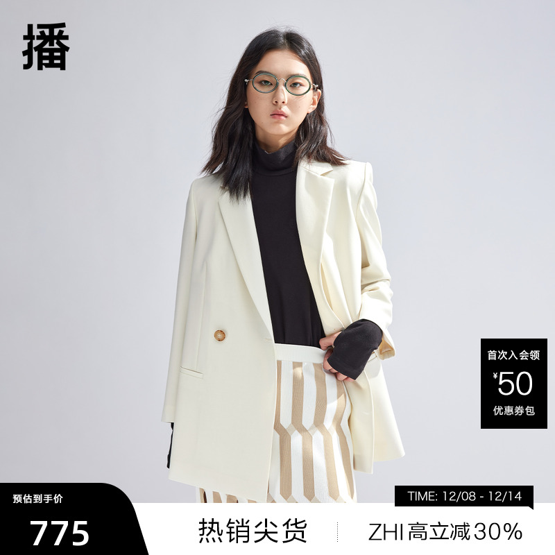 利落西装平驳领,温润牛角扣