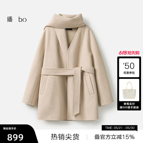 腰间系带收腰，两侧斜插口袋