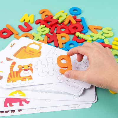 Wooden children spell words with English letters