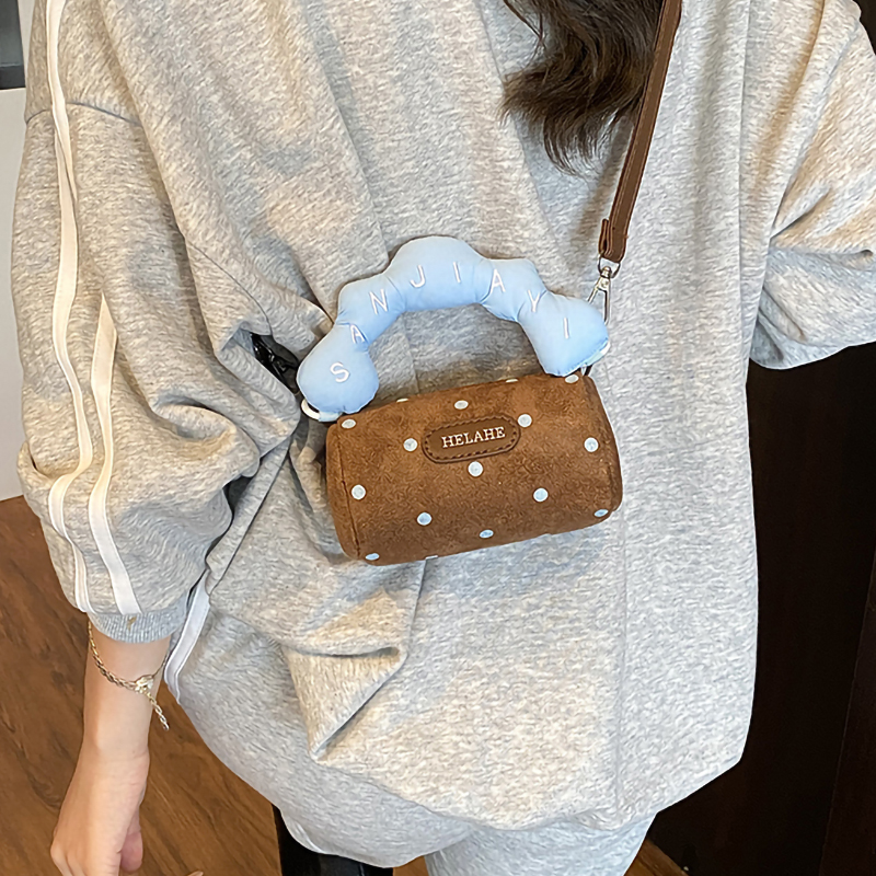 超火复古斜挎小包包女2025新款秋冬小众可爱迷你手拎枕头包耳机包