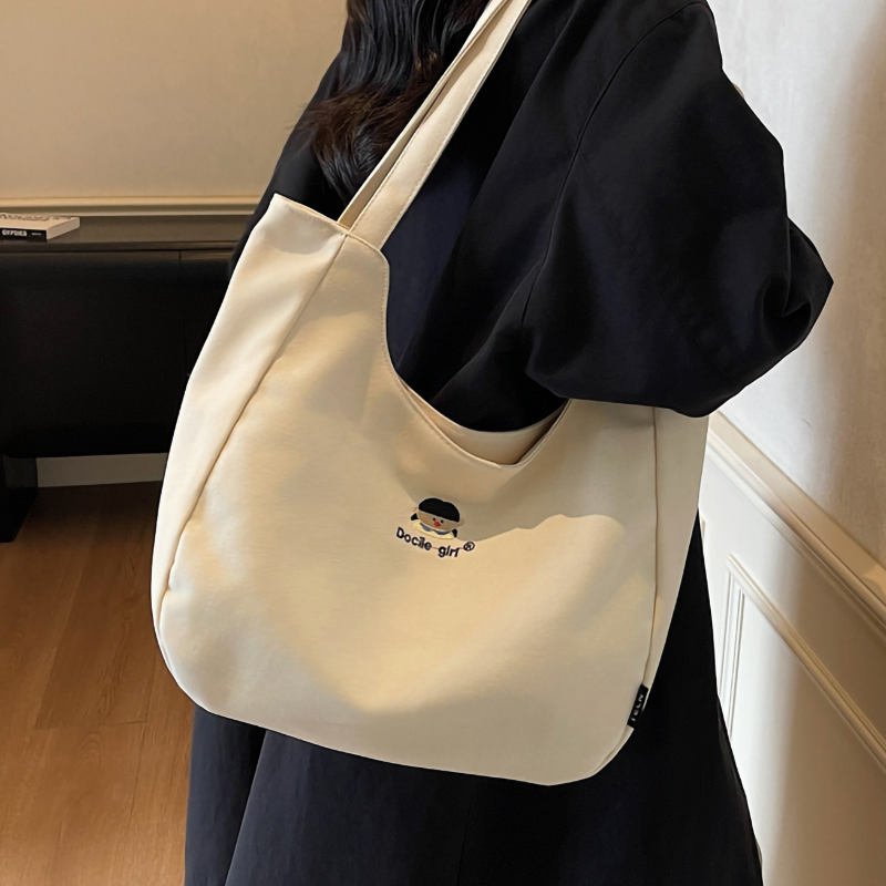 休闲帆布包女2025新款大学生上课通勤手提单肩包大容量爆款托特包