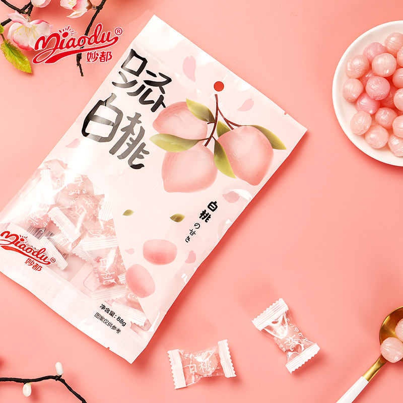 妙都日系の白桃水果汁硬糖88g水蜜桃味创意结婚喜糖散装网红糖果