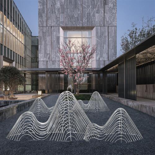 定做不锈钢假山雕塑圆管切片镂空山形鹅卵石水景造型户外创意摆件