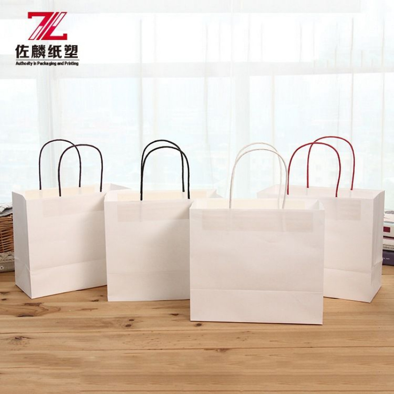 白色手提服装牛皮纸袋广告生日婚礼礼物包装手提袋子加印LOGO