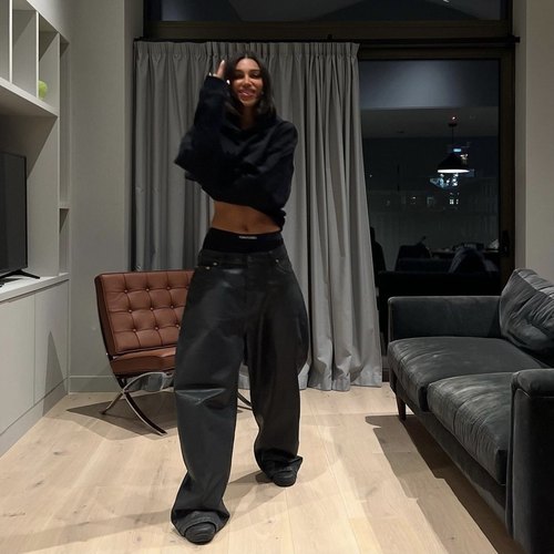 刷蜡涂层蜡面黑色廓形牛仔裤