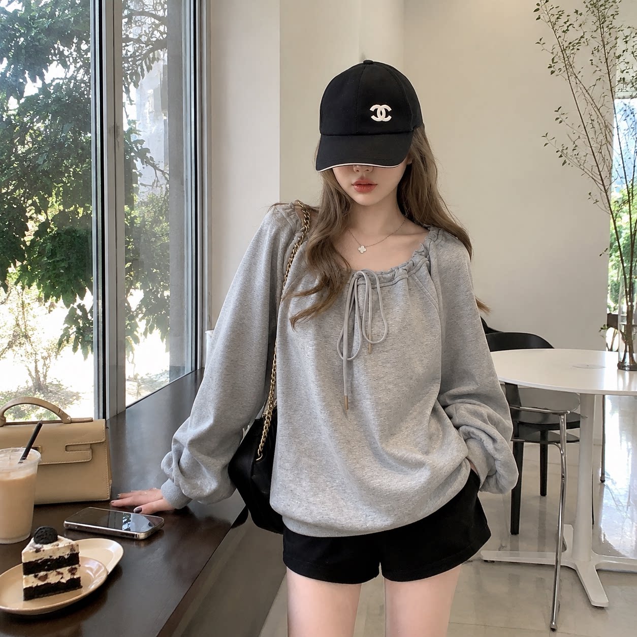 春秋新款宽松斜肩露肩卫衣女