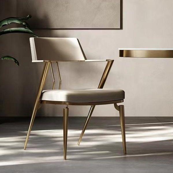 轻奢餐椅设计师款真皮不锈钢书桌凳子意式极简扶手椅子北欧餐椅