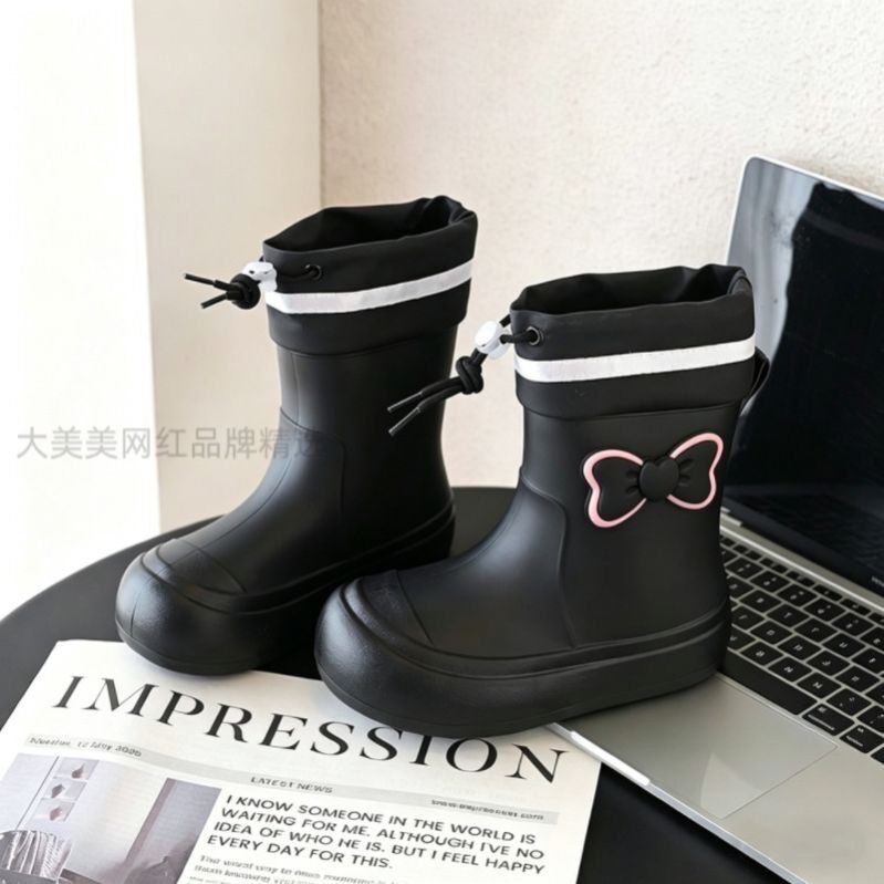 儿童雨靴蝴蝶结亲子户外学生水鞋休闲玩水防滑中筒日系束口女雨鞋