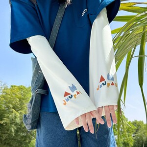 2026新款卡通字母宽松防晒袖套女夏季冰丝防紫外线透气遮阳冰袖潮
