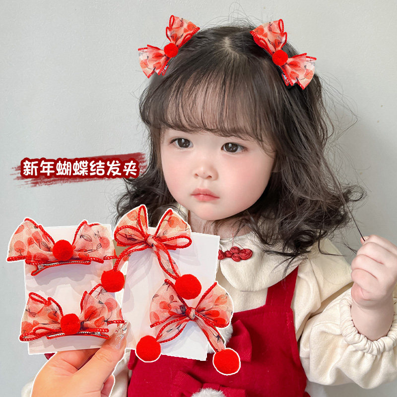 红色毛球蝴蝶结儿童发夹