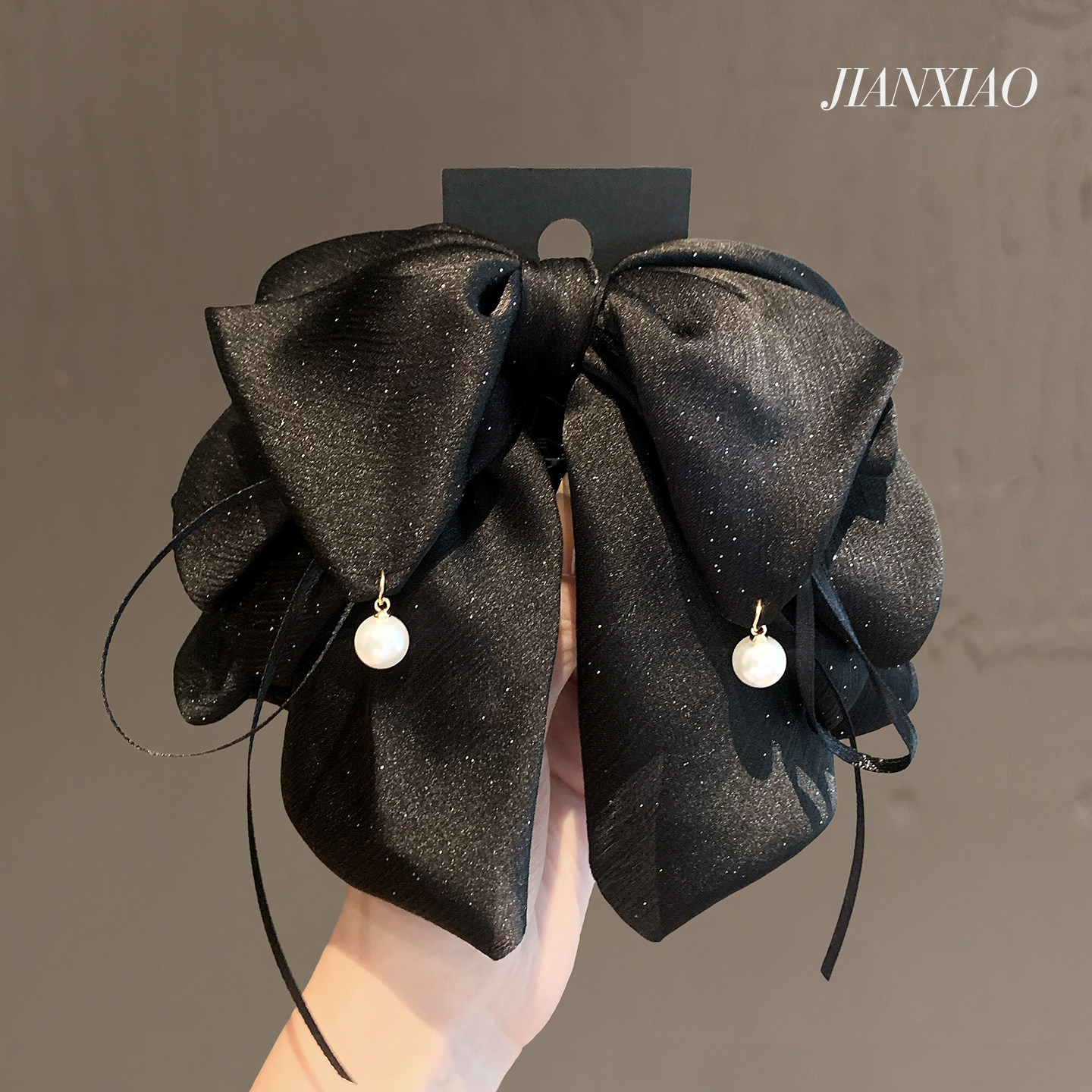 日韩新款满天星蝴蝶结马尾夹优雅珍珠盘发夹百搭后脑勺通勤鲨鱼夹