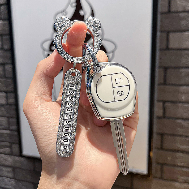 适用长安铃木天语SX4钥匙套维特拉骁途锋驭启悦汽车吉姆尼壳包扣