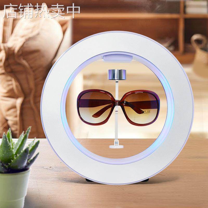 源头工厂磁悬浮眼镜展示架新奇广告宣传摆件旋转亚克力展示台