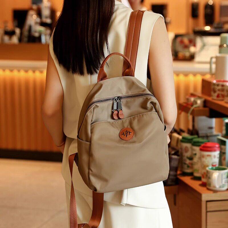 法国DUDK专柜正品大容量双肩包女轻便出行斜挎背包户外登山旅游包