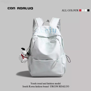 日本简约纯色书包高中初中女生小学生2026新款男大容量双肩包背包