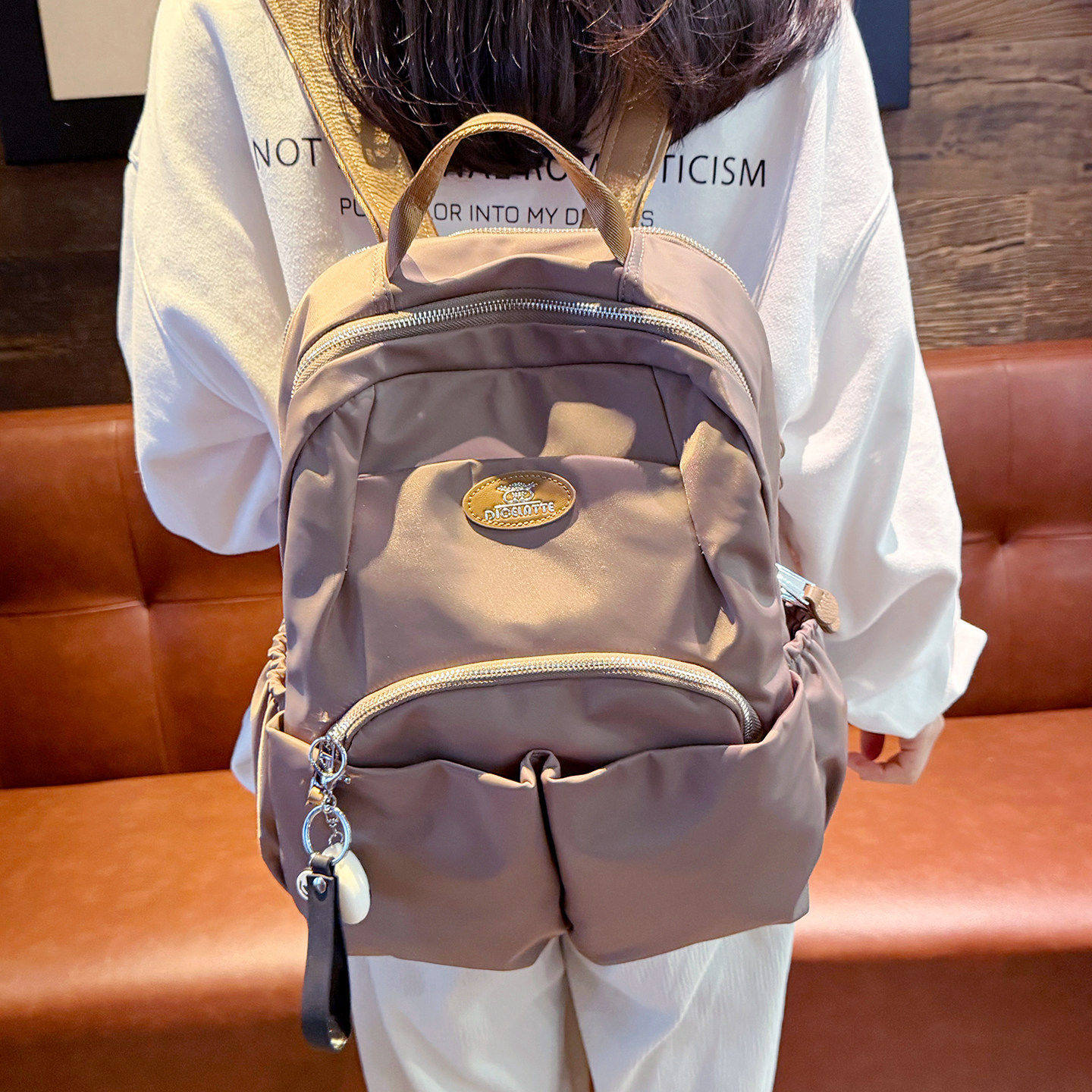 法国DUDK高级感大容量双肩包女新款休闲通勤简约背包轻便电脑包潮