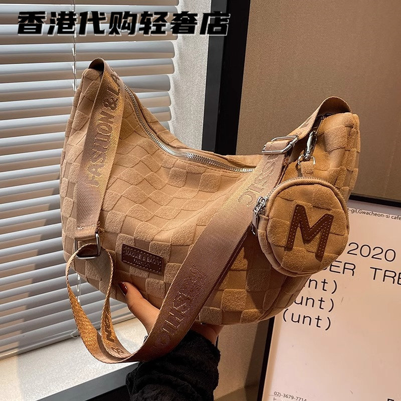 法国ZAMP大容量饺子包包女2026新款休闲帆布包女通勤包单肩斜挎包