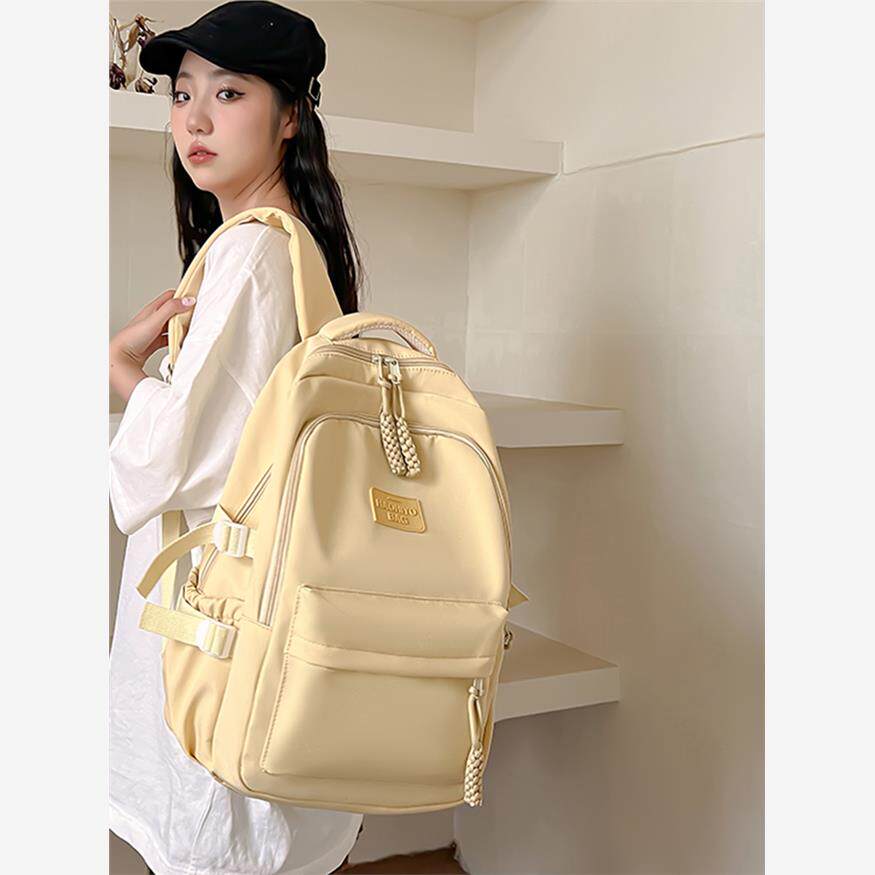 减负护脊初中生书包女中学生高中生大容量大学生简约日系双肩背包