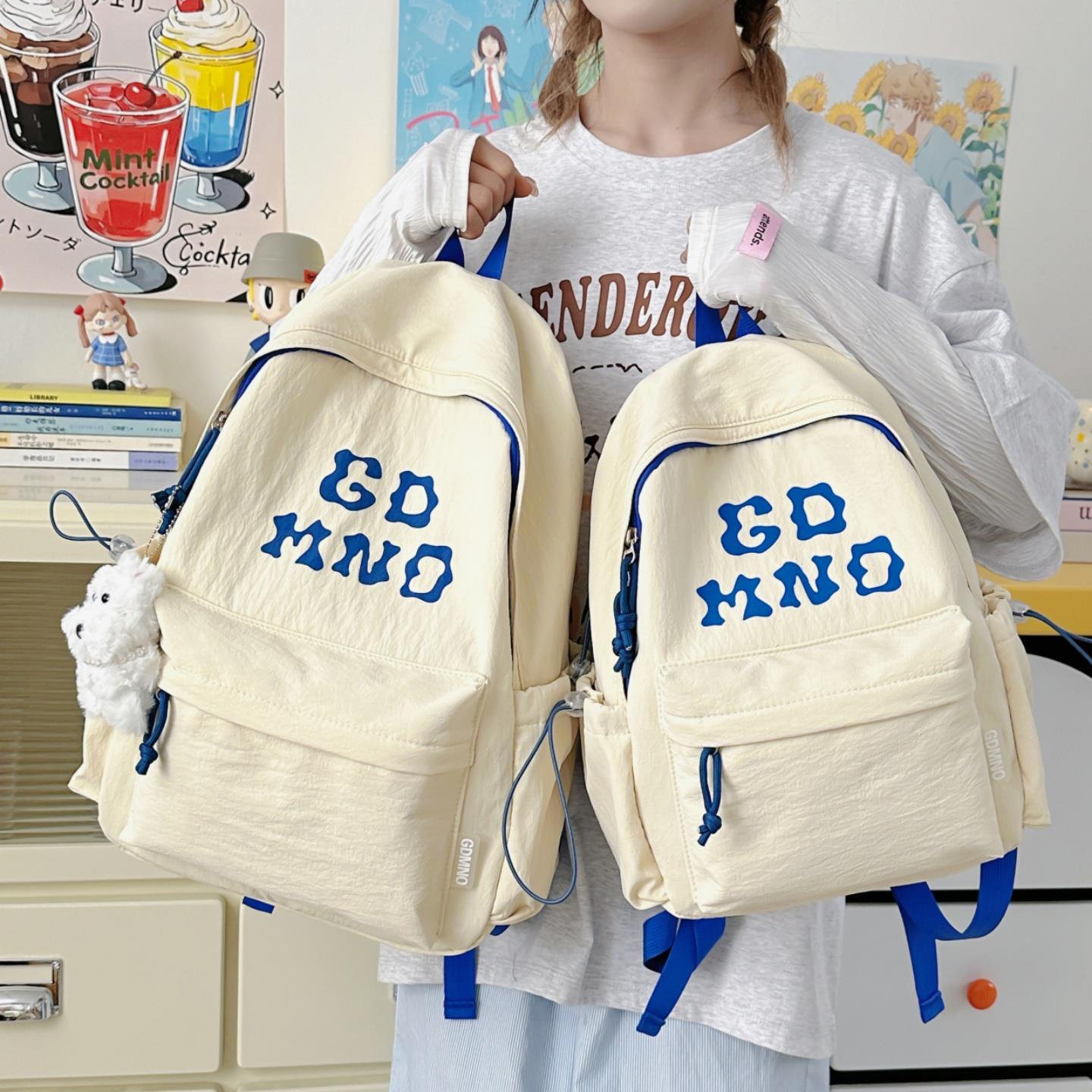 韩版时尚简约高中学生大学生书包女初中生大容量电脑背包男双肩包