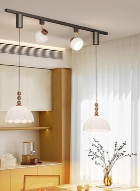 The chandeliers at the French Middle Wind Restaurant can be