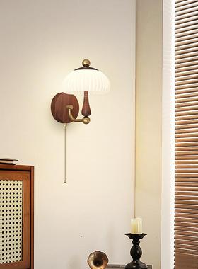 A medieval bed with walnuts and old flasks and an original m