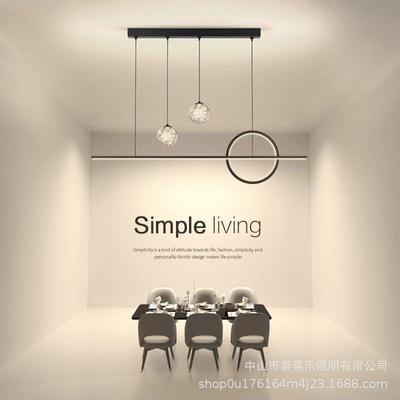 The chandelier at the restaurant is a modern, convoluted lon