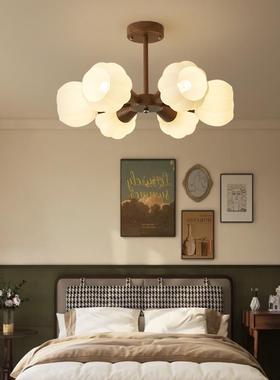 The chandelier in the middle-winded bedroom. The chandelier