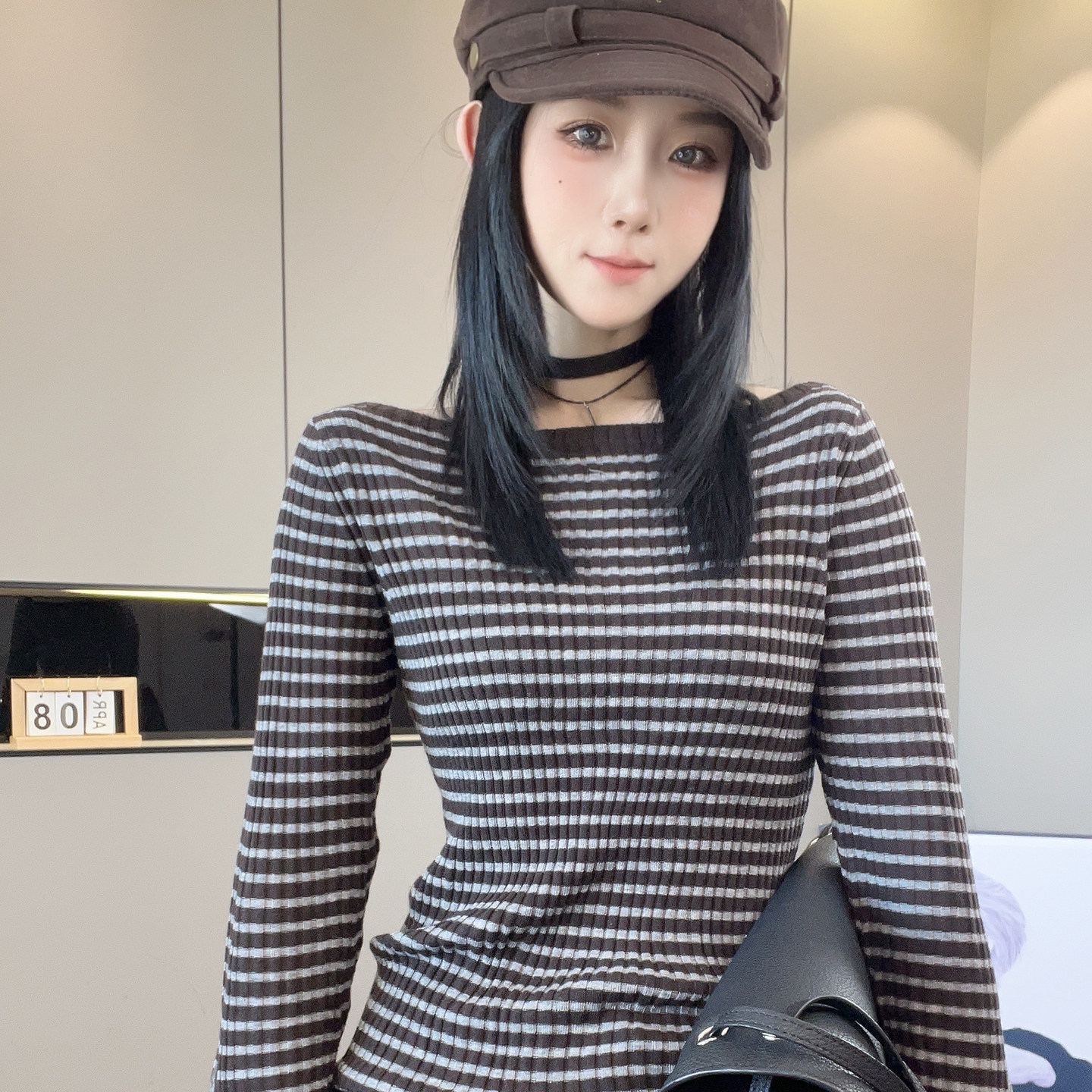 条纹羊毛衫女2026秋季新款欧洲站时尚撞色拼接露肩针织衫长袖上衣