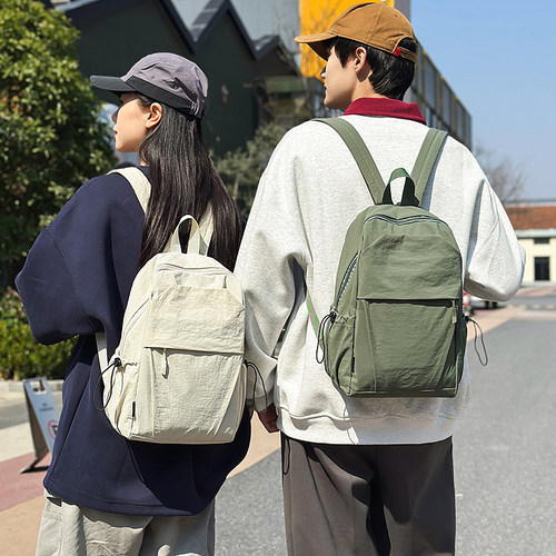 情侣旅行小背包轻便防水小双肩包