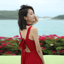 三亚旅行穿搭拍照沙滩裙2025新款红色露背绑带海边度假吊带连衣裙