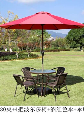 Outdoor tables and chairs with umbrella seats  balcony户外