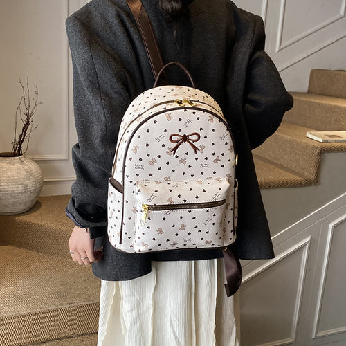 lv5&vv20少女风蝴蝶结印花双肩包女小众设计感大容量通勤背包