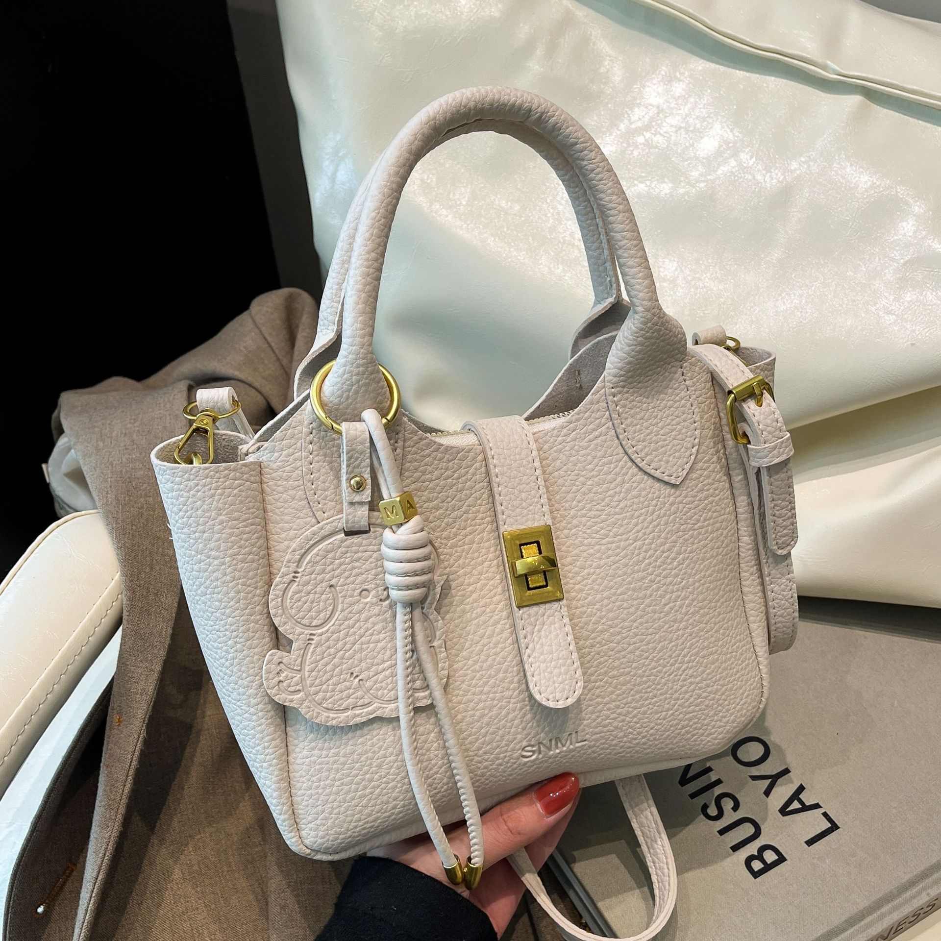 韩版手提菜篮包包女2025新款小众设计感手提包大容量水桶包单肩