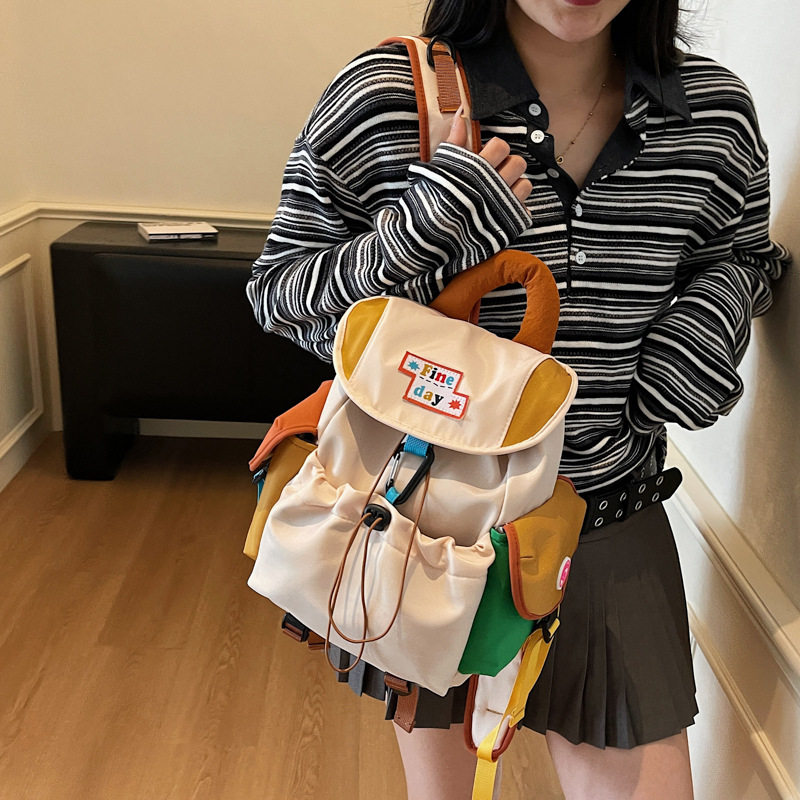 OM新款超轻ins风双肩包多功能潮流学生背包休闲包旅游通勤包书包