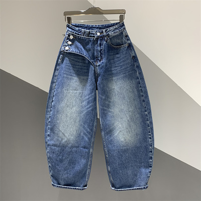做旧水洗设计牛仔弯刀裤女