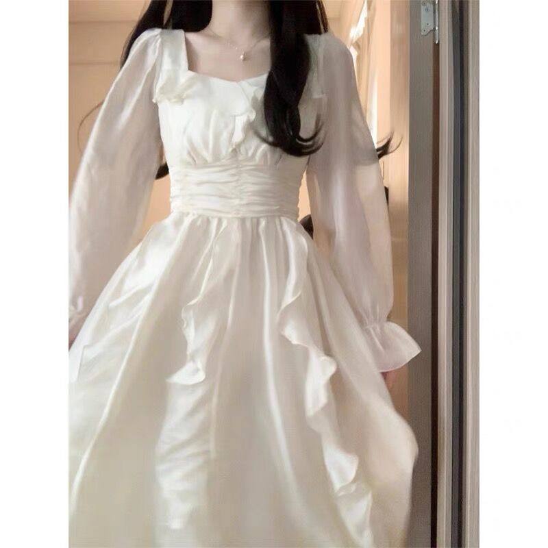 法式温柔风荷叶边长袖连衣裙女春夏2026年新款设计感收腰仙女长裙