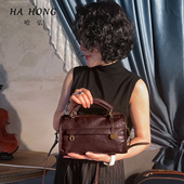 新款 小众复古设计真皮女包手提包头层牛皮软皮斜挎包机车包枕头包