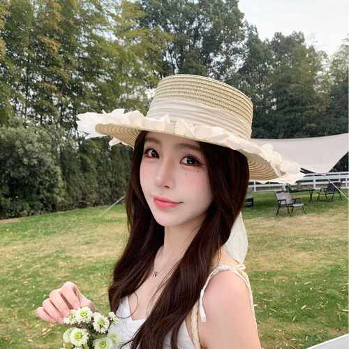 香港高端新款春夏季草帽女透气时尚遮阳帽子百搭镂空太阳帽飘带花