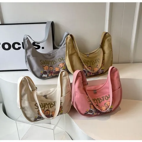 百搭上课日系饺子包卡通新款2024ins风帆布包包大容量女斜挎